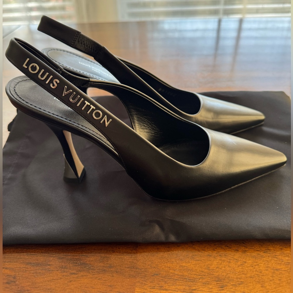 Louis Vuitton Black Leather Heels with the Slingback Design.